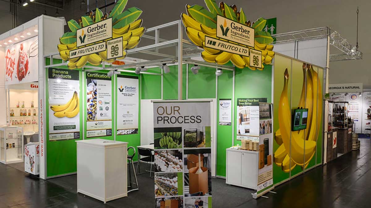 Systemstand 2 Systemstand mit Bananen-Motiven und Präsentationsfläche für Obstprodukte